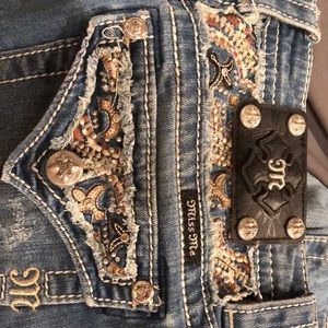 Signature boot cut miss me jeans light wash